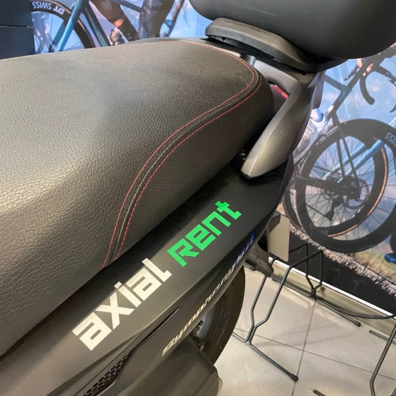 Piaggio motorbike at the Moto Axial Center store — product session